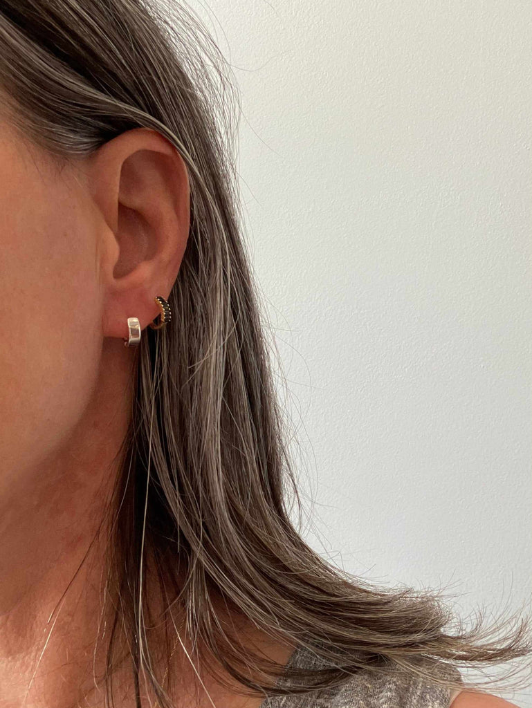 Woman wearing Perfect Little Huggie Earring