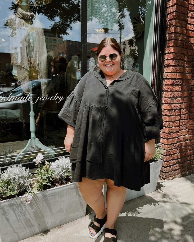 Marin Kirk wearing sunglasses and black dress at Embellish Asheville