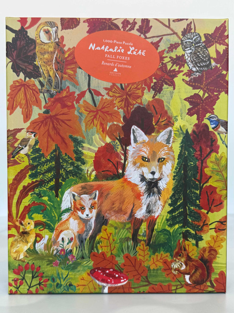 Jigsaw puzzle with autumn-themed illustration of foxes, leaves, and birds on a patterned background.
