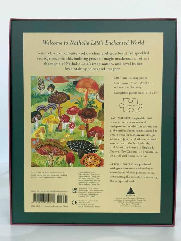 Back of a puzzle box with colorful mushroom illustration and text about Nathalie Leté's Enchanted World.