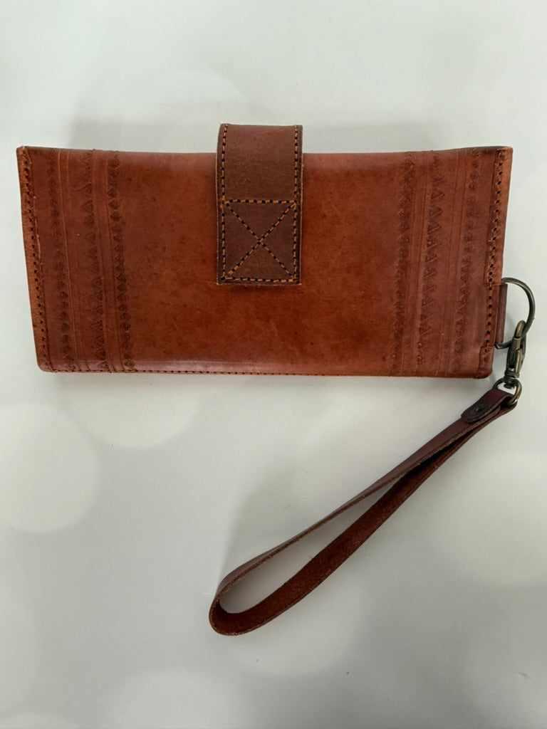 Brown wallet with a strap on a white background