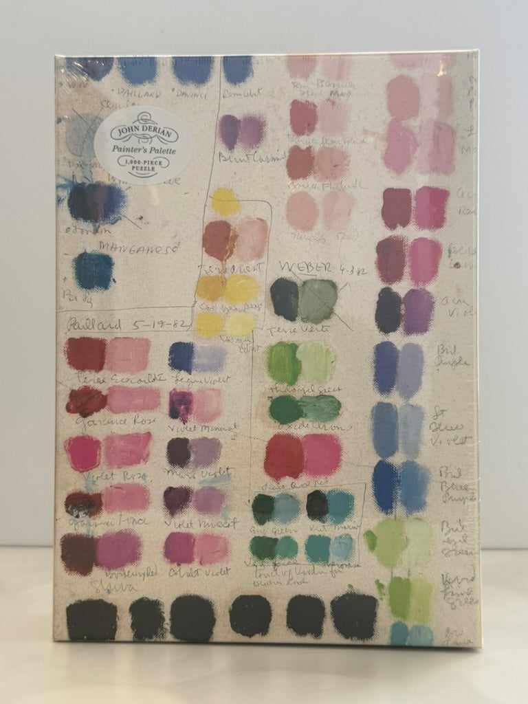 Color swatch jigsaw puzzle with paint samples on a white background