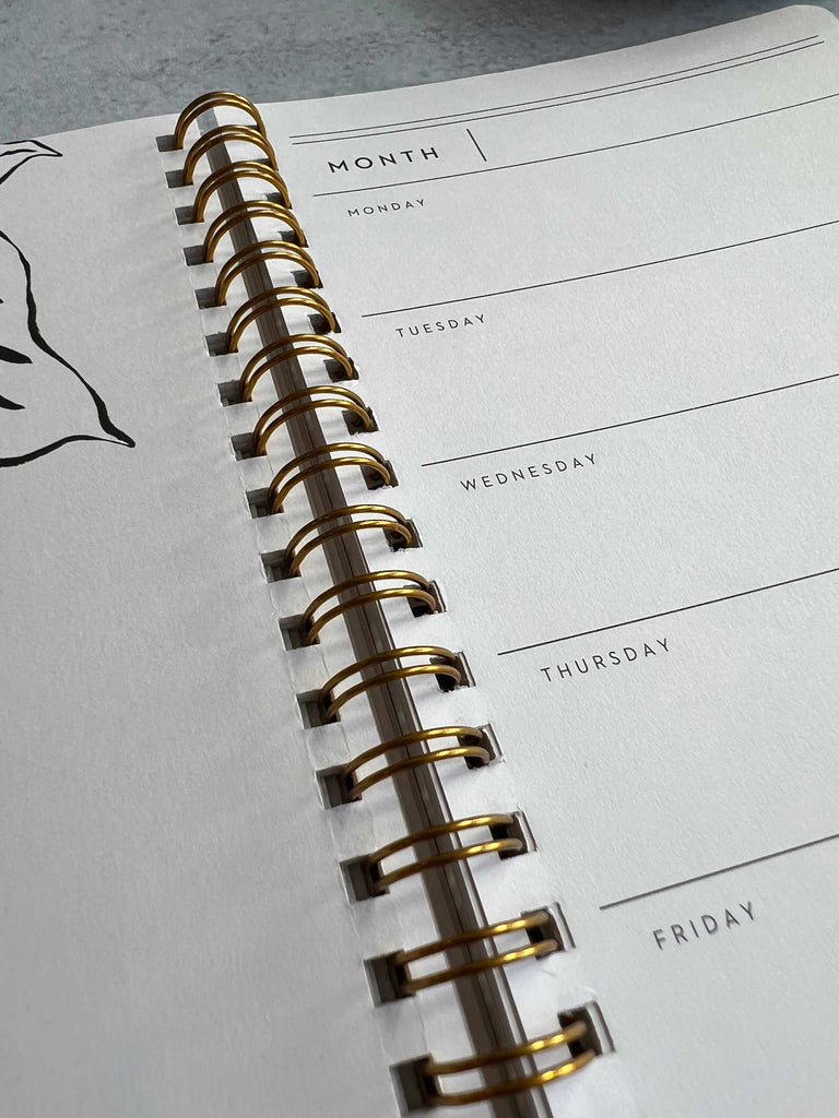 Spiral Binding on Inside of Weekly Planner Pad