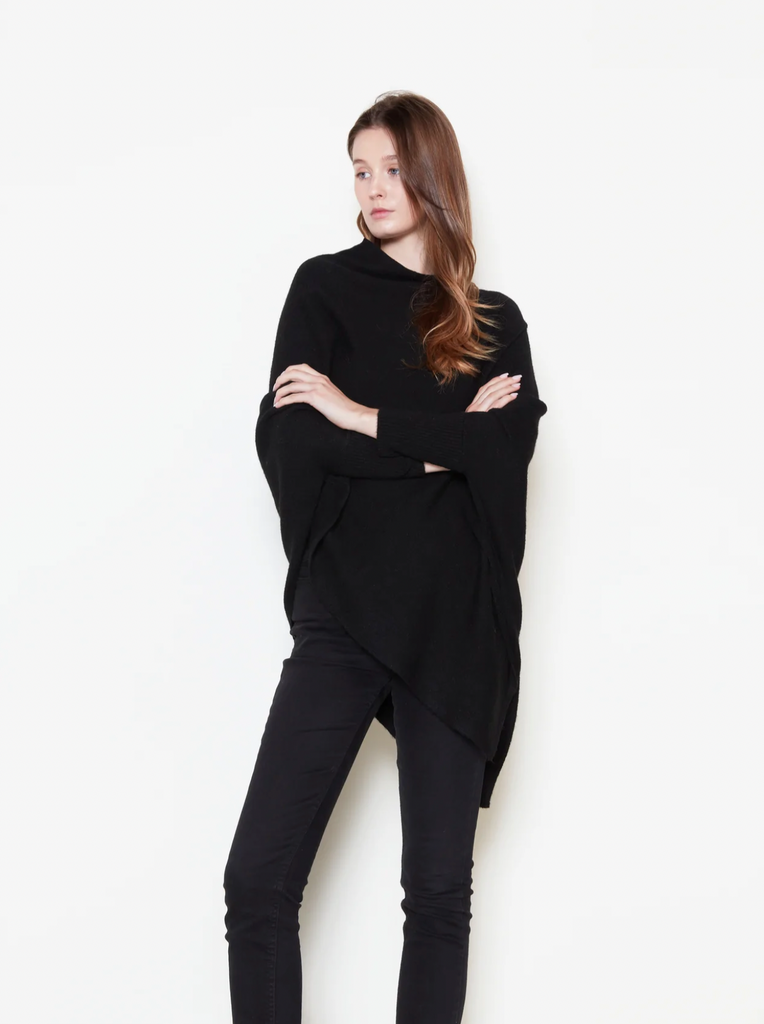 Woman wearing Triangle Poncho with Sleeves in black
