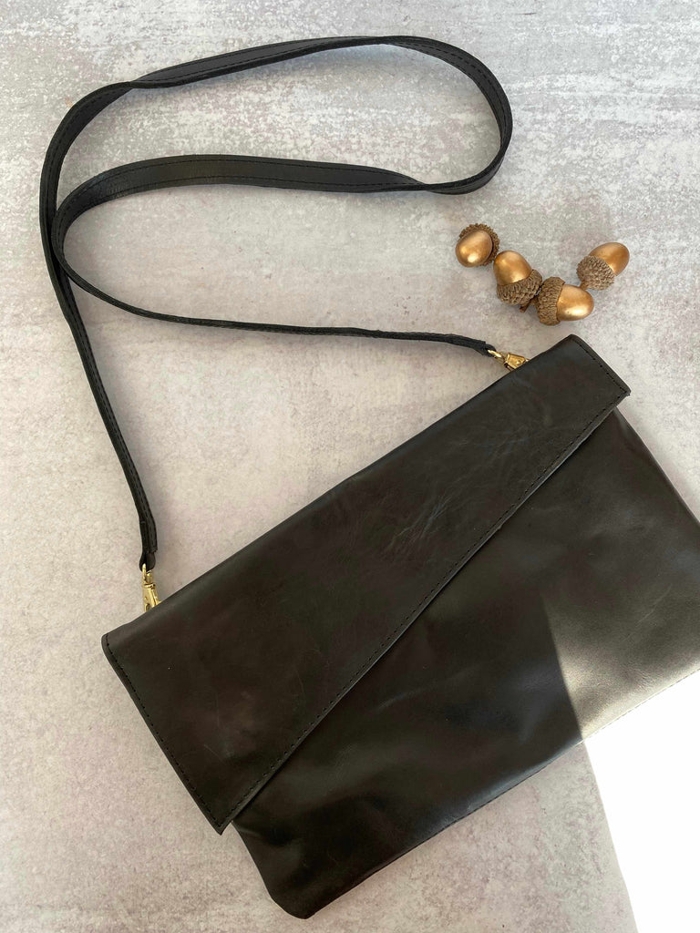 Black convertible crossbody and clutch bag