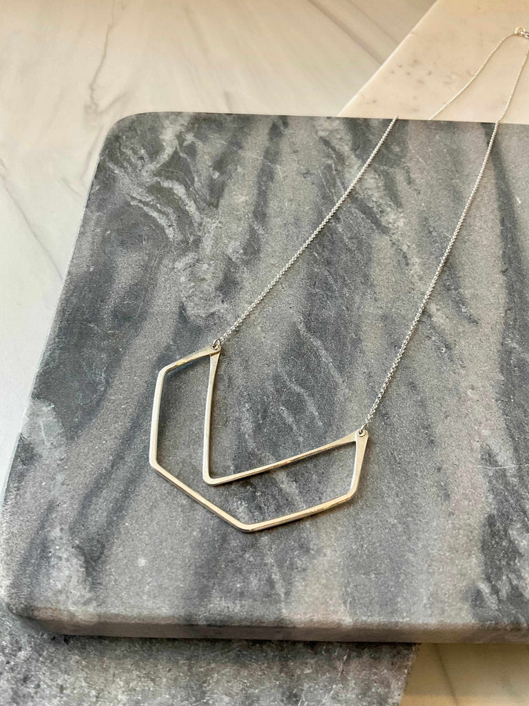Sterling silver geometric pendant on Gable necklace