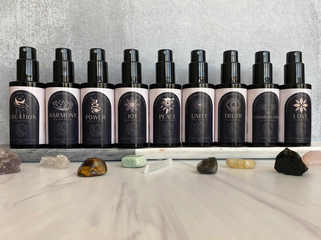 Collection of Crystal Elixir Aura Mists in Bottles